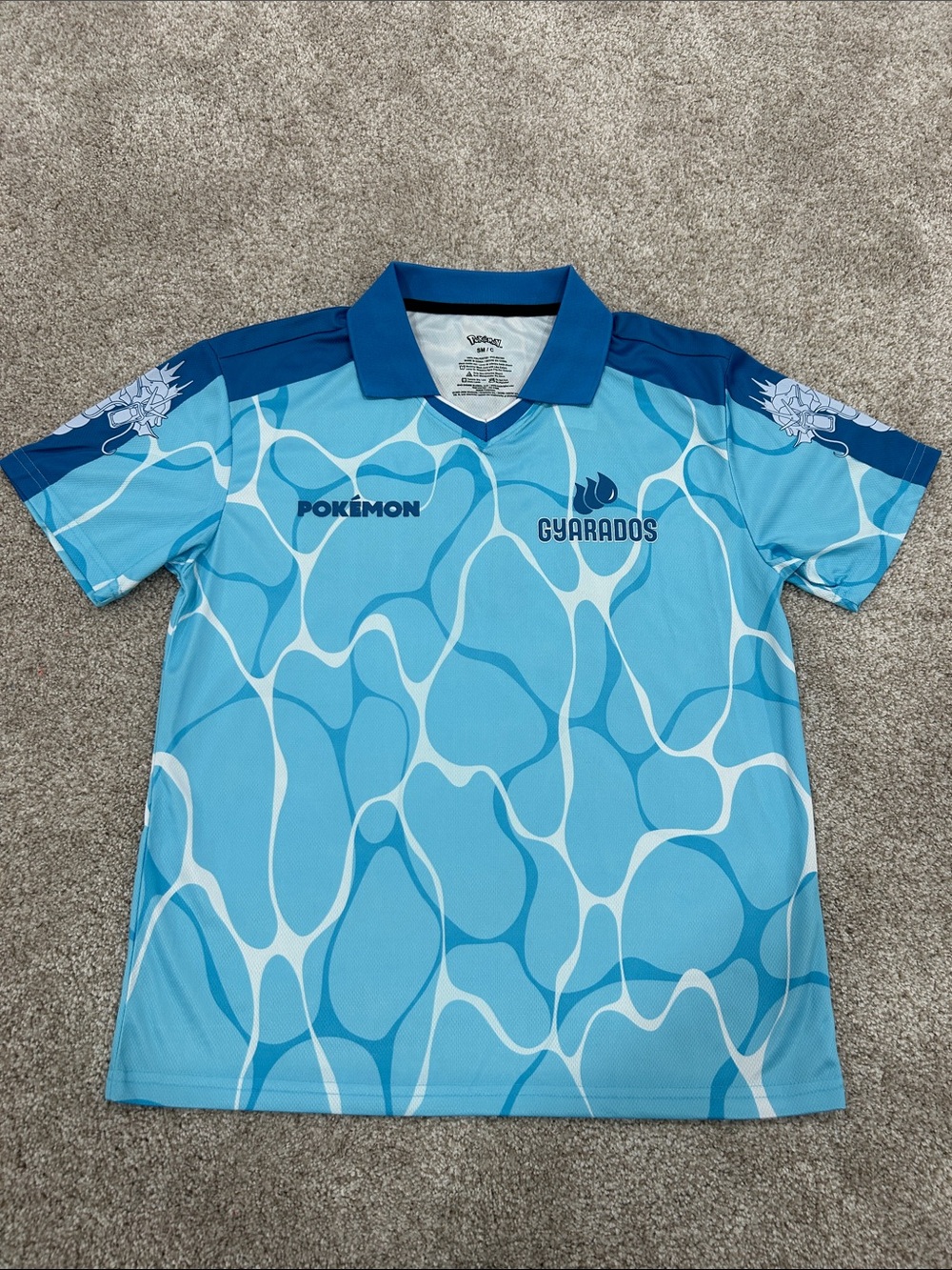 Pokémon Gyarados Men's Soccer Polo Shirt S Blue Graphic Print Short Sleeve